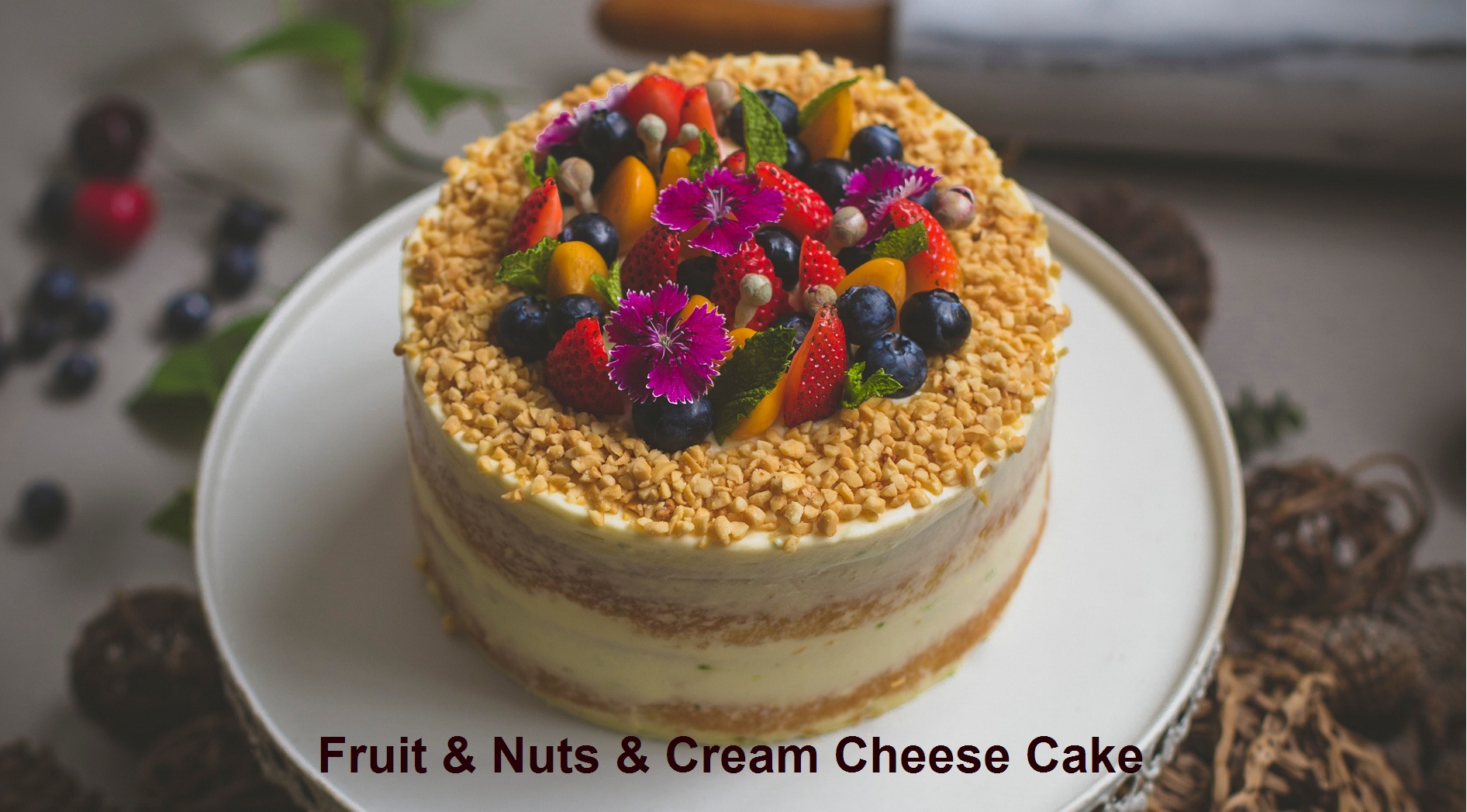 Well decorated fruit and nuts cream cheese cake